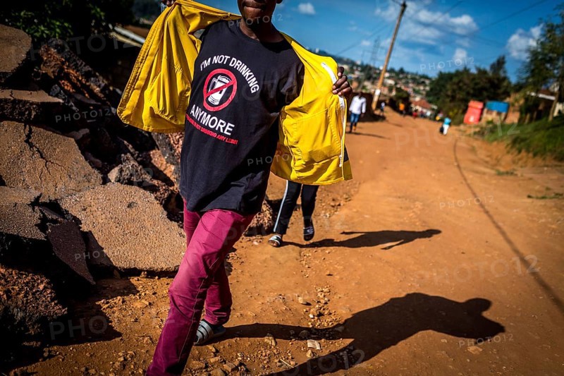 RWA RWANDA RUANDA Kigali A man wearing a shirt on a street in Gikondo district