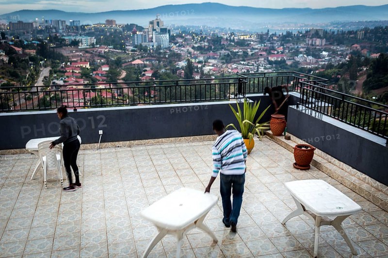RWA RWANDA RUANDA Kigali workers on the terrace of the Panorama Bar Ivy