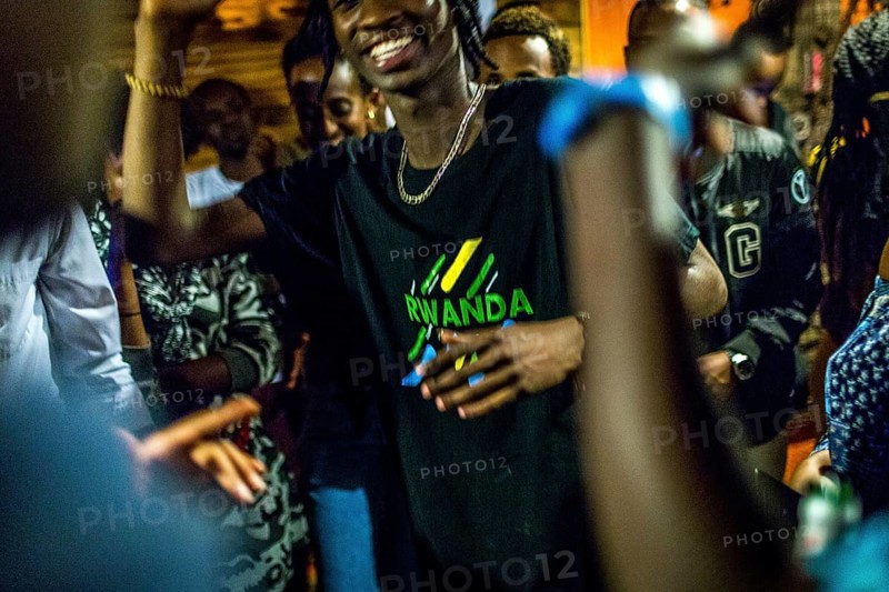 RWA RWANDA RUANDA Kigali Guests at a regular party organised by the Inema Gallery. Artists, locals and expats meet here every Thursday