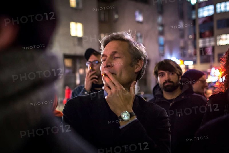 DEU Germany Germany Berlin Smoking for Deniz in front of the Taz. Ulf Pochardt