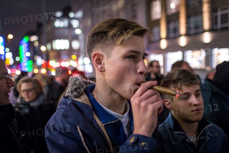 DEU Germany Germany Berlin Smoking for Deniz in front of the Taz
