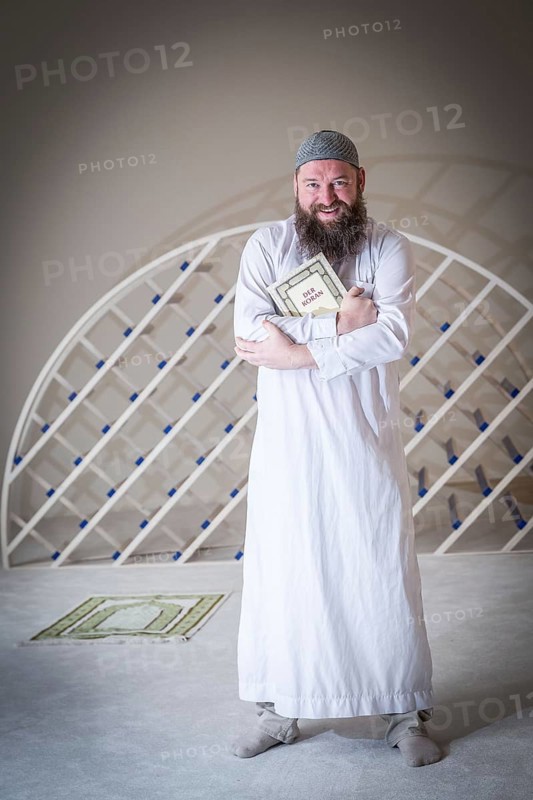 DEU Germany Germany Berlin The head of the Ibn Rushd Goethe Mosque, Christian Hermann, poses in the prayer room. The mosque is located on the premises of the Protestant St John's Church in Moabit