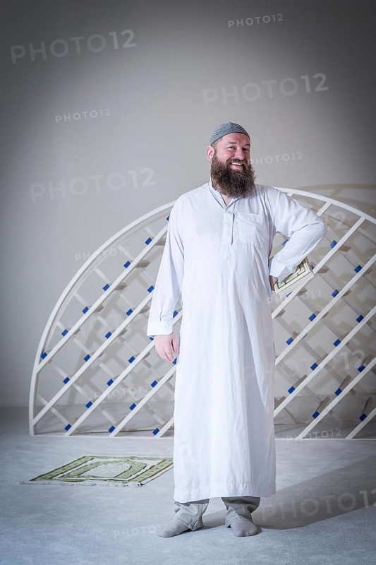 DEU Germany Germany Berlin The head of the Ibn Rushd Goethe Mosque, Christian Hermann, poses in the prayer room. The mosque is located on the premises of the Protestant St John's Church in Moabit