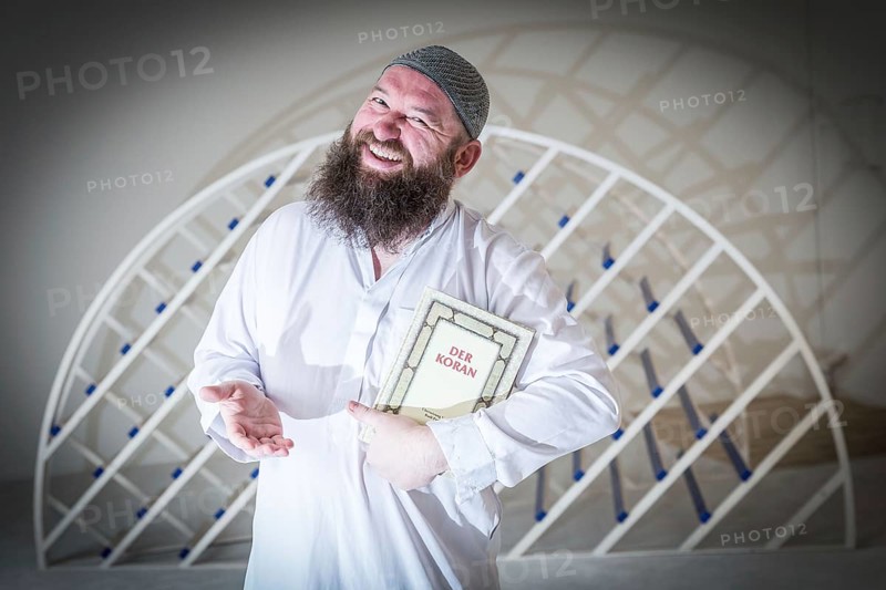 DEU Germany Germany Berlin The head of the Ibn Rushd Goethe Mosque, Christian Hermann, poses in the prayer room. The mosque is located on the premises of the Protestant St John's Church in Moabit