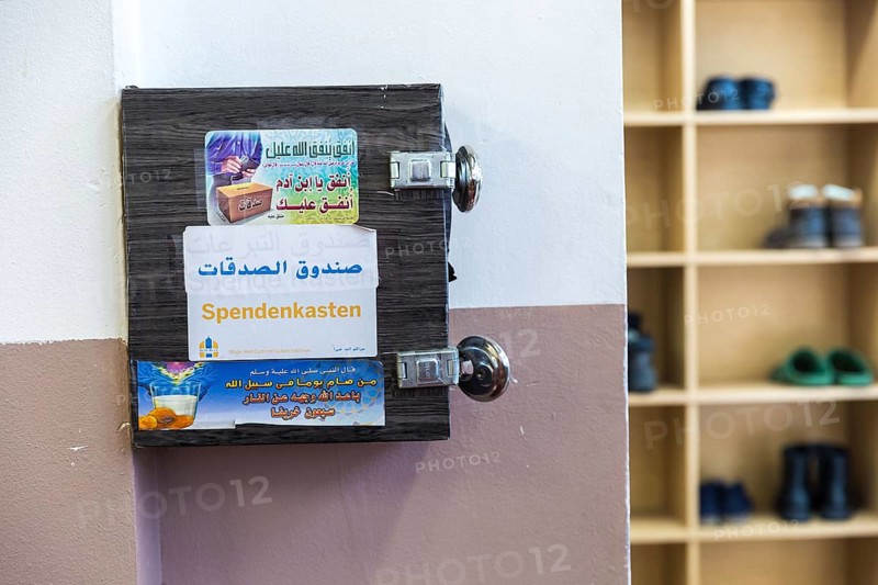 DEU Germany Germany Berlin View of the Haus der Weisheit mosque in Moabit.donation box