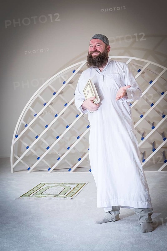 DEU Germany Germany Berlin The head of the Ibn Rushd Goethe Mosque, Christian Hermann, poses in the prayer room. The mosque is located on the premises of the Protestant St John's Church in Moabit