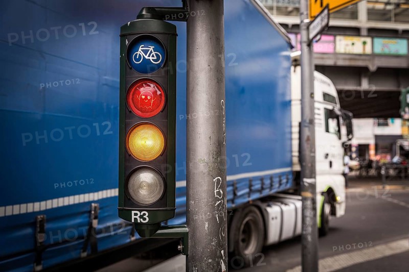 DEU Germany Germany Berlin A lorry stands at an intersection at Kottbusser Tor, where cyclists and pedestrians cross the road