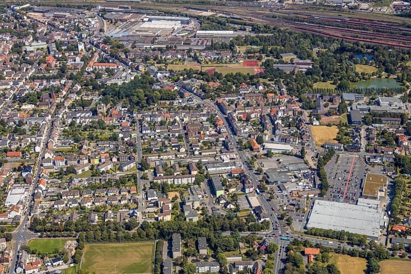 Aerial view, course of Wilhemstraße with new district centre, between former LEZ, now Kaufland in the west and former Thyssen administration at the main station, Hamm, Ruhr area, North Rhine-Westphalia, Germany, DE, Europe, birds-eyes view, aerial view, aerial photography, aerial photography, overview, bird's eye view