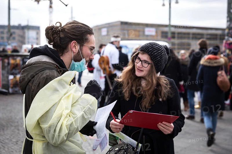 DEU Germany Germany Berlin Members of the 'Referendum for Healthy Hospitals' initiative collect signatures at Warschauer Brücke in Friedrichshain to realise a referendum
