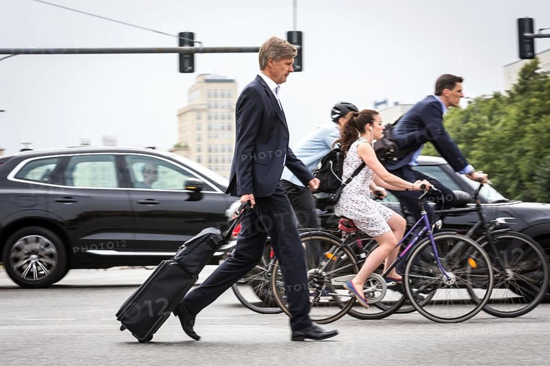 DEU Germany Germany Berlin Scene with cyclists in traffic in the capital Karl-Marx-Alle, corner of Otto-Braun-Str