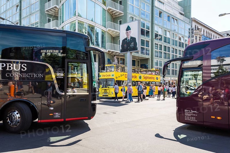 DEU Germany Germany Berlin Scene at Checkpoint Charlie, the former diplomatic border crossing in Berlin.bus transport