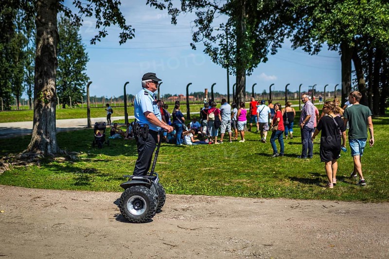 POL Poland Poland Auschwitz-Birkenau Guard on Segway in the Auschwitz-Birkenau camp
