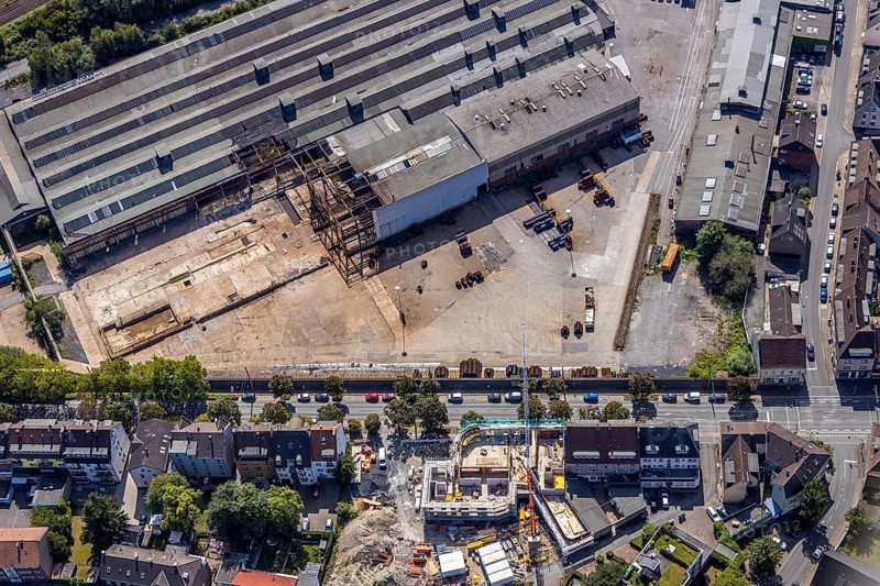 Aerial view, construction site on the WDI site between Bahndamm and Otto-Brenner-Straße, new district centre Wilhelmstraße, Hamm, Ruhr area, North Rhine-Westphalia, Germany, DE, Europe, birds-eyes, view, aerial photograph, aerial photography, aerial photography, overview, overview, bird's eye view, railway line, railway network, infrastructure, transport, train traffic, freight traffic, railway network, metal processing, metal processing, industry, production, workplaces