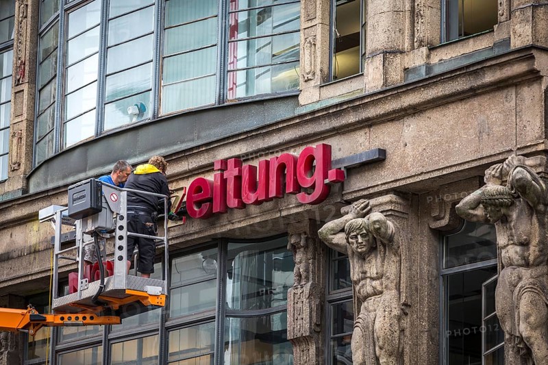 DEU Germany Germany Berlin The dismantling of the TAZ lettering on the old TAZ building on Rudi-Dutschke-Str