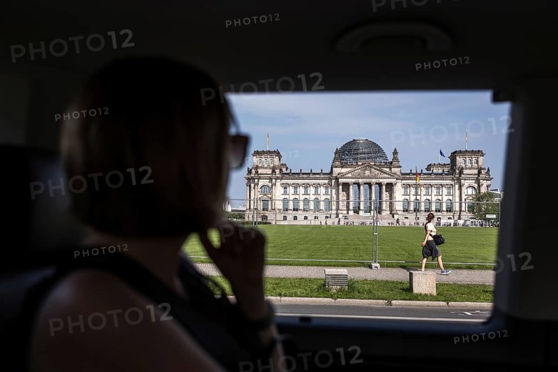 DEU Germany Germany Berlin City tour to the sights of the capital. View of the Reichstag from the tour bus