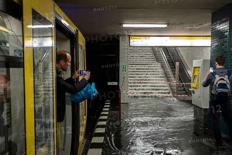 DEU Germany Germany Berlin Scene of the storm in Berlin. Souvenir photo in the flooded Güntzelstraße underground station in Schöneberg
