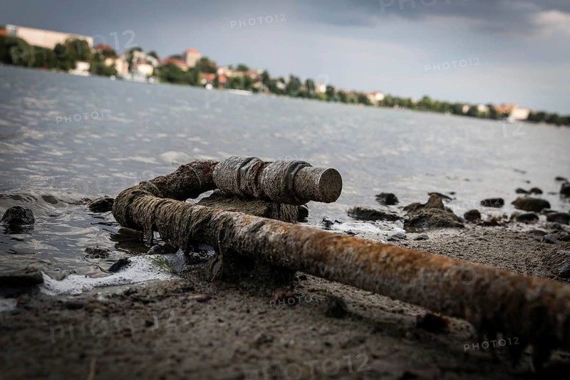 DEU Germany Germany Strausberg Shore pictures of Straussee Rotten water pipe on shore property