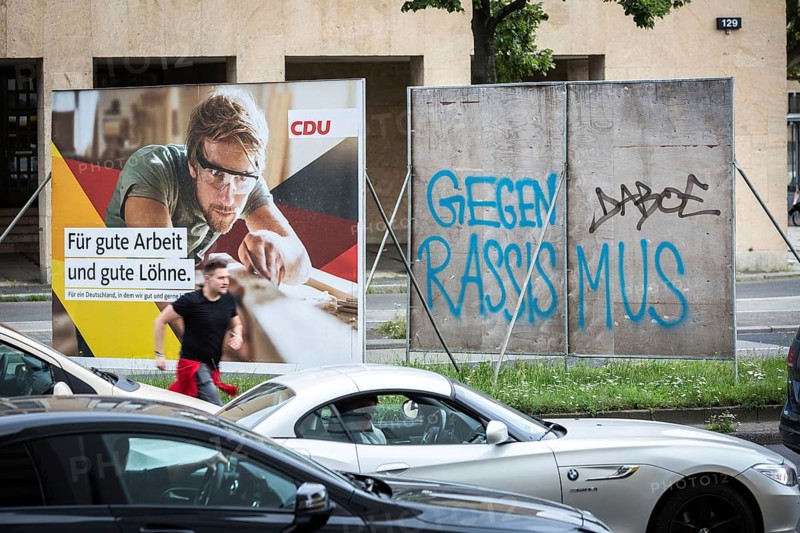 DEU Germany Germany Berlin The back of a poster for the Bundestag election is inscribed with protest against racism