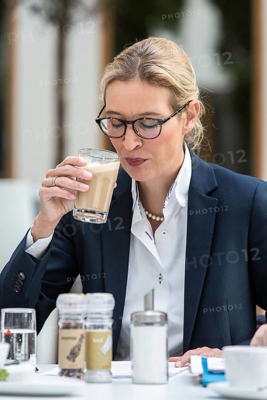 DEU Germany Germany Berlin AFD top candidate Alice Weidel drinks a cafe latte in front of a press conference on asylum and development policy
