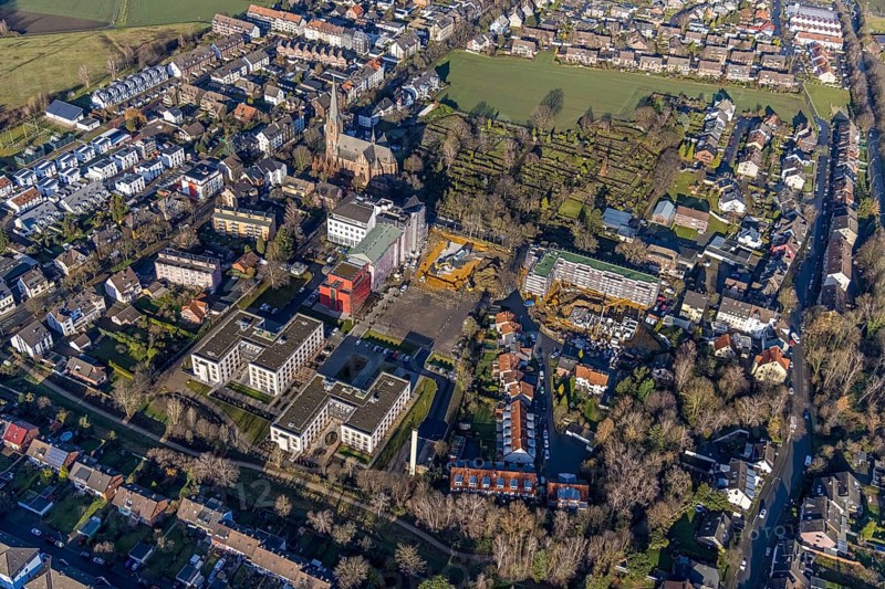 Aerial view, construction site Widumer Höfe, the future retirement home of the St. Elisabeth Group, St. Peter and Paul Catholic Church, Widumer Straße Catholic Cemetery, Sodingen, Herne, Ruhr area, North Rhine-Westphalia, Germany. Widumer Straße cemetery, Sodingen, Herne, Ruhr area, North Rhine-Westphalia, Germany, retirement home, old people's home, retirement home, place of worship, construction work, building, construction area, building site, building plots, construction project, construction site, burial site, care and nursing, DE, Europe, cemetery, memorial site, religious community, place of worship, house of God, crypt, graves, burial ground, church, parish, denomination, aerial photograph, aerial photography, aerial photography, Rhine-Ruhr metropolitan region, new building, care facility, religion, resting place, retirement home, retirement residence, retirement home, retirement centre, overview, bird's-eye view, Widumer Straße, birds-eyes view, overview