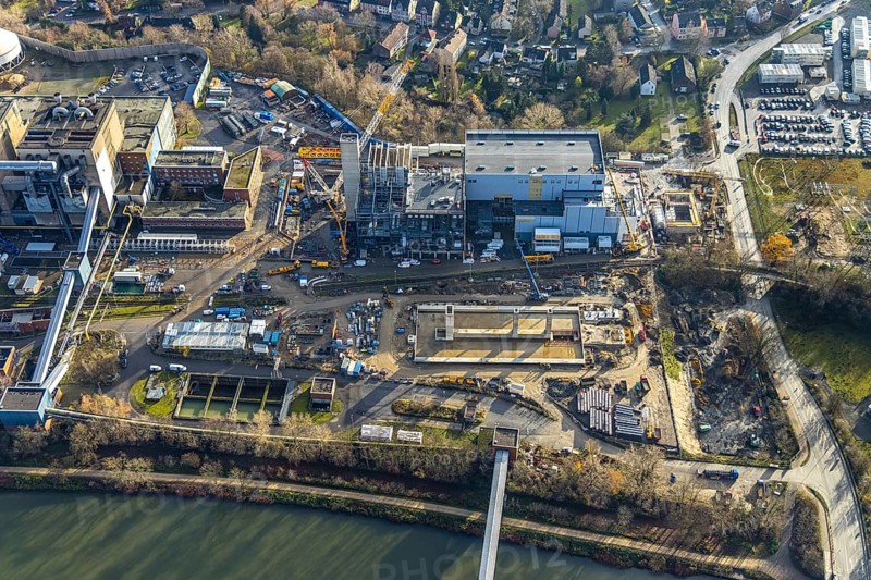 Aerial photograph, STEAG Herne combined heat and power plant on the Rhine-Herne Canal, construction site of Steag's new gas and steam power plant, Baukau-West, Herne, Ruhr area, North Rhine-Westphalia, Germany, construction work, construction, construction area, construction site, construction measure, construction project, construction site, DE, E-Werk, Europe, district heating, combined cycle power plant, Hertener Straße, power plant, aerial view, aerial photography, aerial photography, Rhine-Ruhr metropolitan region, new construction, coal-fired power plant, overview, bird's-eye view, overview