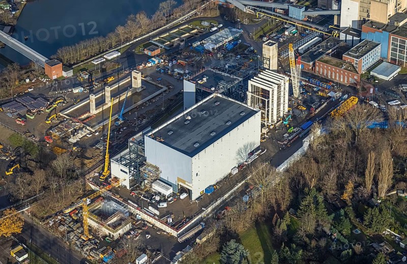 Aerial photograph, STEAG Herne combined heat and power plant on the Rhine-Herne Canal, construction site of Steag's new gas and steam power plant, Baukau-West, Herne, Ruhr area, North Rhine-Westphalia, Germany, construction work, construction, construction area, construction site, construction measure, construction project, construction site, DE, E-Werk, Europe, district heating, combined cycle power plant, Hertener Straße, power plant, aerial view, aerial photography, aerial photography, Rhine-Ruhr metropolitan region, new construction, coal-fired power plant, overview, bird's-eye view, overview