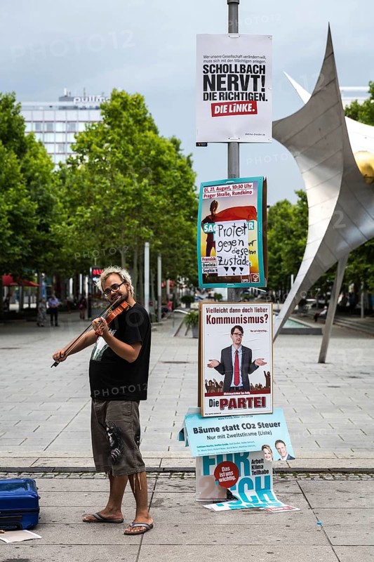 DEU Germany Germany Dresden Impressions of election day in the Saxon state capital.Geiger in the pedestrian zone
