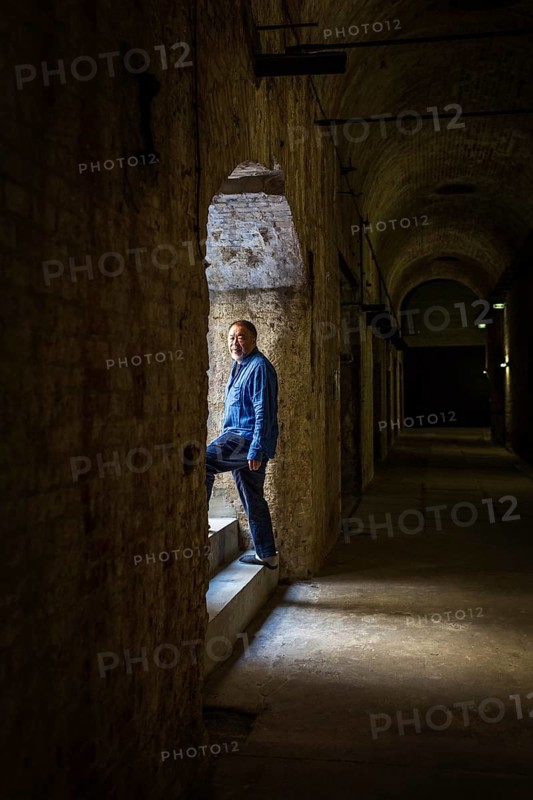 DEU Germany Germany Berlin The Chinese artist Ai Weiwei in his studio in the vaulted cellar of the Pfefferberg in the centre of Berlin