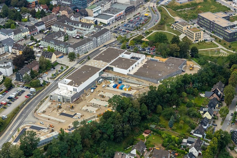 Aerial view, construction site new building at Hefelmann-Park, shopping centre, Westfalenstraße, former Kiekert site, Heiligenhaus, Ruhr area, North Rhine-Westphalia, Germany, Am Hefelmann-Park, construction work, construction, construction area, building site, building plots, construction measure, construction project, construction site, DE, Europe, aerial view, aerial photography, aerial photography, new building, panorama cycle path, overview, bird's-eye view, overview, local supply centre, former foundry Hitzbleck
