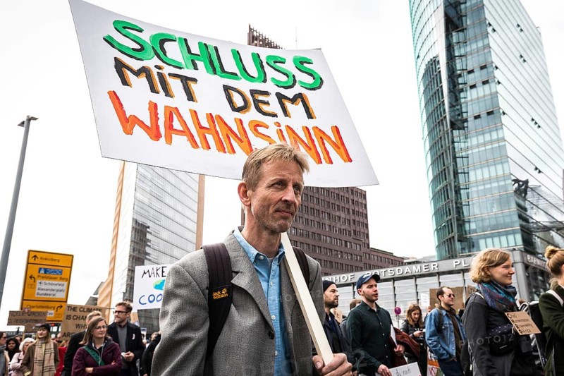 DEU Germany Germany Berlin Protests for climate protection. Modulor founder Christoph Struhk walks across Potsdamer Platz during the entrepreneurs for future demonstration