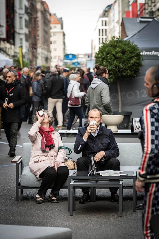 DEU Germany Germany Berlin Part of Friedrichsstrasse is closed to traffic at the weekend. Pedestrians use the street for a stroll or to sit on a sofa
