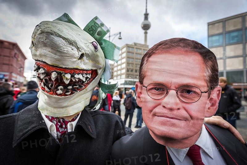DEU Germany Germany Berlin Demonstration against rent increases and gentrification. rent shark and the governing mayor Michael Müller as protest masks