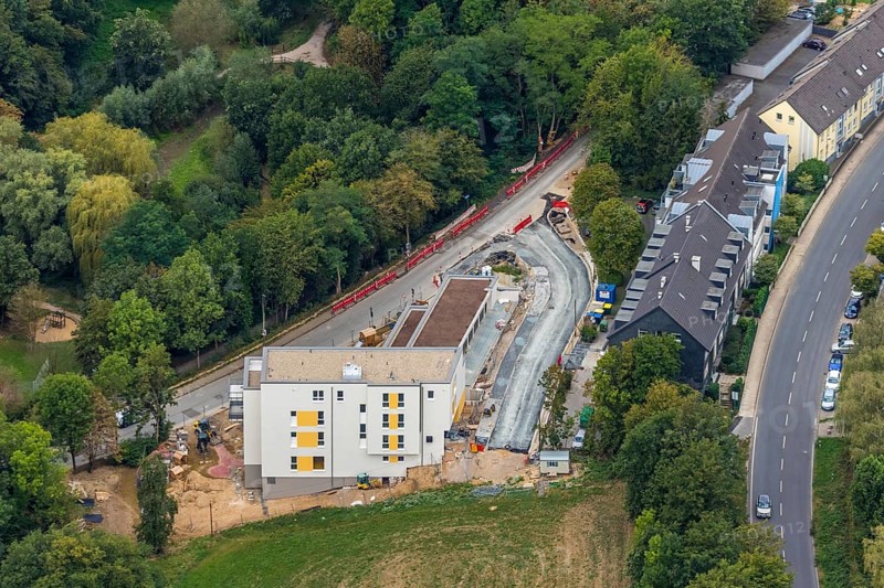 Aerial view, construction site, new multi-family house with day care centre, Elisabeth-Selbert-Straße, Kurt-Schumacher-Straße, Heiligenhaus, Ruhr area, North Rhine-Westphalia, Germany, construction work, building, construction area, building site, building plots, construction project, construction site, DE, Europe, property tax, real estate, kindergarten, day nursery, day care centre, day nursery, aerial view, aerial photography, aerial photography, new building, overview, bird's-eye view, residential complex, housing and living, residential area, residential buildings, residential quality, residential quarter, housing estate, birds-eyes view, overview