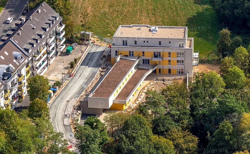 Aerial view, construction site, new multi-family house with day care centre, Elisabeth-Selbert-Straße, Kurt-Schumacher-Straße, Heiligenhaus, Ruhr area, North Rhine-Westphalia, Germany, construction work, building, construction area, building site, building plots, construction project, construction site, DE, Europe, property tax, real estate, kindergarten, day nursery, day care centre, day nursery, aerial view, aerial photography, aerial photography, new building, overview, bird's-eye view, residential complex, housing and living, residential area, residential buildings, residential quality, residential quarter, housing estate, birds-eyes view, overview