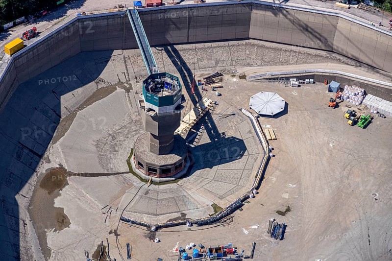 Aerial photo, RWE has completely emptied the large upper reservoir for the main inspection at the Herdecke pumped storage power plant. The plant will be off the grid for a few weeks, storage reservoir, RWE pumped storage power plant, Köpchenwerk, Herdecke, Ruhr area, North Rhine-Westphalia, Germany&lt, construction work, construction area, construction measure, construction project, construction site, DE, Germany, Europe, Ruhr river, Hengsteysee, aerial photograph, aerial photography, aerial photography, pumped storage power plant Köpchenwerk, RWE, lake, overview, bird's-eye view, forest area, birds-eyes view, overview