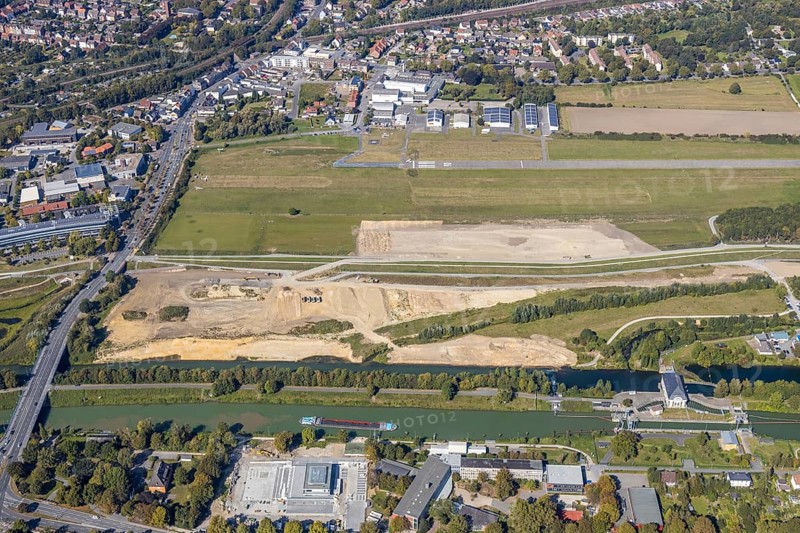 Aerial view, Hamm airfield, Lippe floodplain, Hamm lock, Lippe river, Datteln-Hamm canal, construction site, Hamm, Ruhr area, North Rhine-Westphalia, Germany, wastewater treatment plant, wastewater treatment, DE, Europe, flight emission, airport, aircraft noise, airfield, airfield area, sewage treatment plant, runway, aerial view, aerial photography, aerial photography, Münsterstraße, runway, overview, bird's eye view, water treatment plant, water purification plant, birds-eyes view, overview