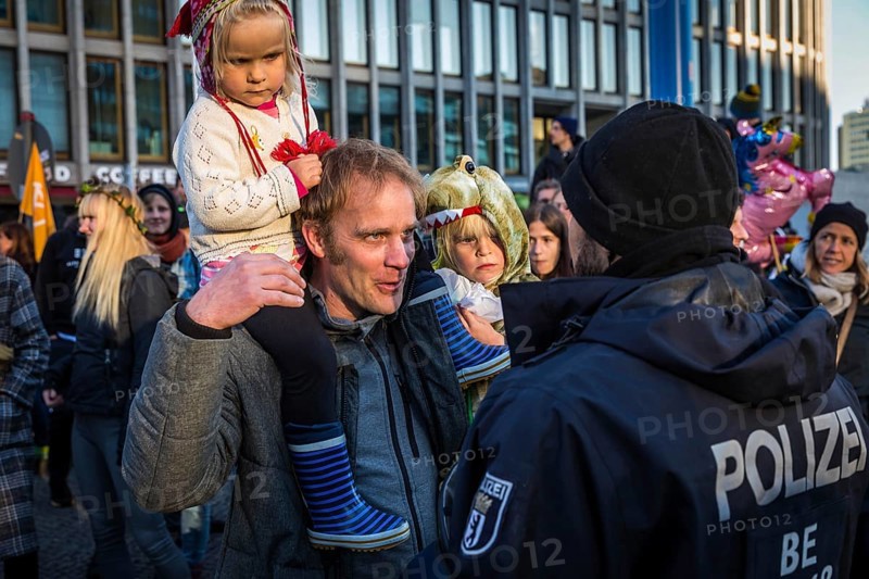 DEU Germany Germany Berlin Protesters of the Extinction Rebellion movement during the occupation of Potsdamer Platz.father with children discussing with police officers