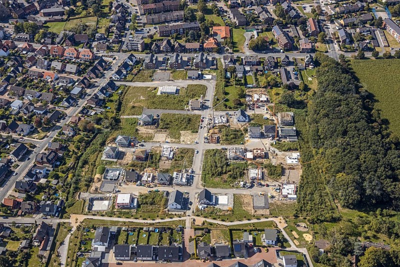 Aerial view, Schulze-Everding residential park, new construction area, Bockum-Hövel, Hamm, Ruhr area, North Rhine-Westphalia, Germany, Am Eversbach, construction work, construction vehicles, construction area, construction site, building plots, construction project, construction site, DE, development, Europe, property tax, real estate, capacity requirement, aerial view, aerial photography, aerial photography, new construction, overview, bird's-eye view, meadows and fields, housing estate, housing and living, residential area, residential buildings, housing quality, residential neighbourhood, housing estate, birds-eyes view, overview