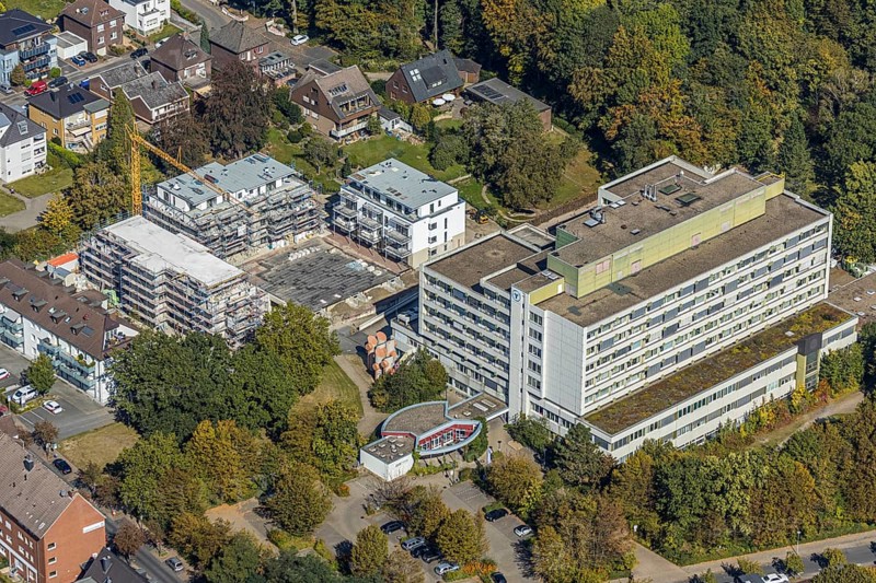 Aerial view, construction site new building at St. Josef Hospital Hamm-Bockum-Hövel, Hamm, Ruhr area, North Rhine-Westphalia, Germany, construction work, construction area, construction site, building plots, construction crane, construction measure, construction project, construction site, DE, Europe, healthcare, hospital, capacity requirement, clinic, clinic centre, hospital, aerial view, aerial photography, aerial photography, medical facility, medical aid, new building, emergency service, overview, bird's eye view, birds-eyes view, overview, medical care