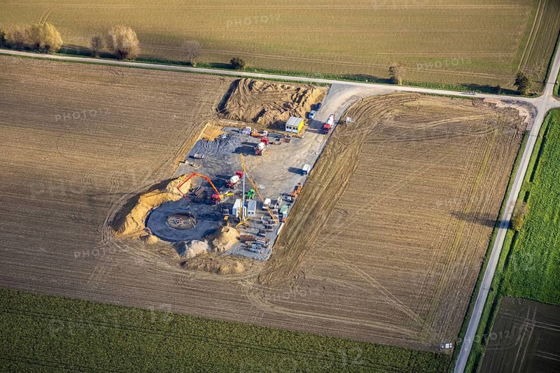 Aerial photo, construction site for wind turbines, Hellweg, near the A2 motorway, Rhynern, Hamm, Ruhr area, North Rhine-Westphalia, Germany, construction work, construction, construction area, construction site, construction site, construction project, construction site, DE, Europe, aerial photo, aerial photography, aerial photography, new construction, overview, bird's eye view, WTG, meadows and fields, wind energy, wind turbine, wind power, wind turbine, wind turbines, bird's eye view, overview