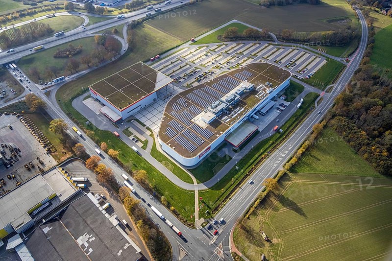 Aerial view, Möbel Höffner, commercial area Unnaer Straße, Hamm, Ruhr area, North Rhine-Westphalia, Germany, DE, Europe, commercial enterprises, commercial area, commercial area, commercial location, commercial use, industrial area, industrial building, industrial location, aerial view, aerial photography, aerial photography, photovoltaics, photovoltaic system, solar, solar system, solar energy, solar energy, overview, bird's eye view, birds-eyes view, overview