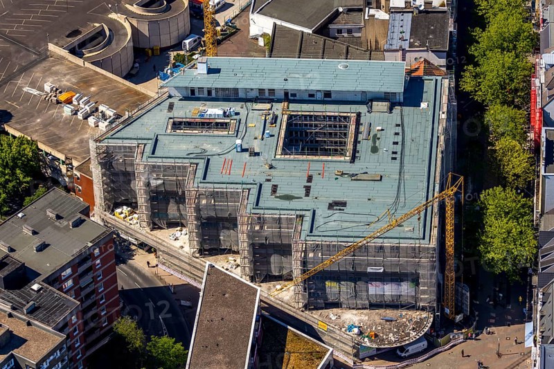Aerial view, construction site Neue Höfe Herne, Herne, Ruhr area, North Rhine-Westphalia, Germany, construction work, construction area, construction site, building plots, construction project, construction site, office building, DE, Europe, capacity requirement, aerial photograph, aerial photography, aerial photography, overview, bird's eye view, birds-eyes view, former Hertie building, green forest, overview