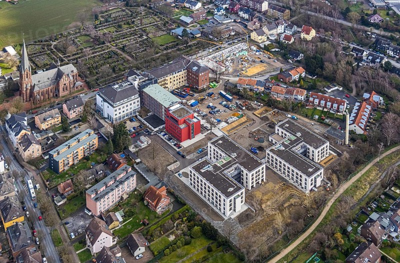 Aerial view, health campus, senior centre Widumer Höfe, on the campus of the St.Elisabeth Group, at the Marienhospital-Herne II and nursing school, next to the Catholic Church St.Peter and Paul and, construction site new residential complex Widumer Quartier, in Sodingen in Herne, Ruhr area, North Rhine-Westphalia, Germany, Herne, DE, Europe, birds-eyes, view, aerial view, aerial photography, aerial photography, overview, overview, bird's eye view, living, in, old age, retirement home, nursing home, health, care, doctors, medicine, surgery, therapy, house of God, religion, faith, worship, mass