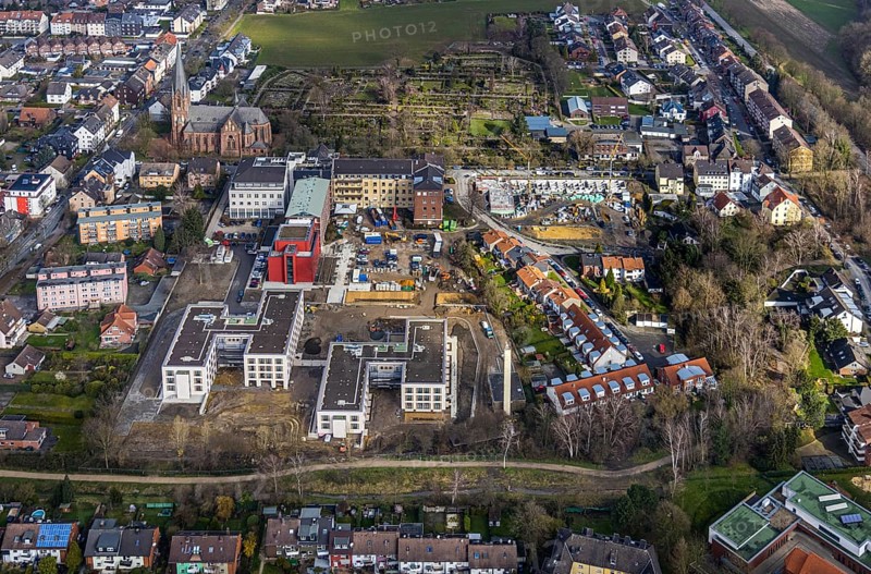 Aerial view, Widumer Höfe senior centre on the campus of the St.Elisabeth Group at Marienhospital-Herne II and nursing school next to the Catholic Church of St.Peter and Paul and construction site of new residential complex Widumer Quartier in Sodingen in Herne, Ruhr area, North Rhine-Westphalia, Germany, Herne, DE, Europe, birds-eyes, view, aerial view, aerial photography, aerial photography, overview, overview, bird's eye view, living, in, old age, retirement home, nursing home, health, care, doctors, medicine, surgery, therapy, house of God, religion, faith, worship, mass