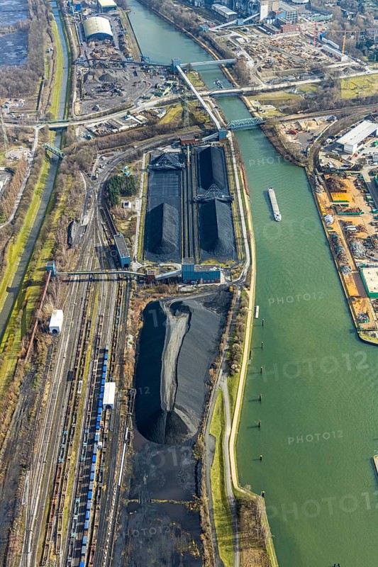 Aerial view, coal storage at the Rhine-Herne Canal, Herne, Ruhr area, North Rhine-Westphalia, Germany, DE, Europe, birds-eyes, view, aerial photography, aerial photography, overview, bird's eye view, waterway, shipping traffic, transport, logistics, movement of goods, ships, waters, energy, wind energy, power station, electricity, power supply, electricity generation, power generation