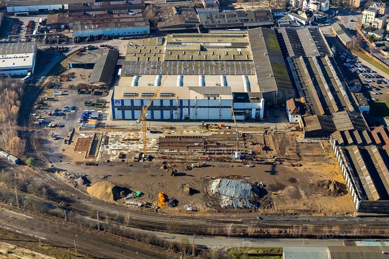 Aerial view, new construction, WDI Westfälische Drahtindustrie AG, Hamm, Ruhr area, North Rhine-Westphalia, Germany, construction work, construction, construction area, construction site, construction crane, construction measure, construction project, construction site, DE, development, Europe, commercial area, commercial use, industrial plants, industrial area, industrial site, capacity requirement, aerial view, aerial photography, aerial photography, new construction, production plants, production halls, overview, bird's eye view, Wilhelmstrasse, birds-eyes view, overview