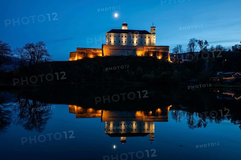 Moon over Trautenfels Castle, reflection in a lake, blue hour, near Irdning, Ennstal, Styria, Austria