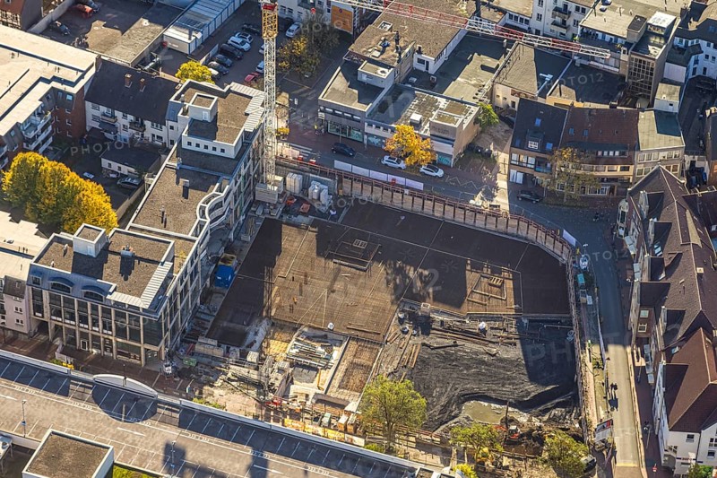 Aerial view, construction site with demolition and new construction of the western half of the Ritterpassage at the Allee-Center shopping center, Mitte, Hamm, Ruhr area, North Rhine-Westphalia, Germany, demolition, avenue center, construction site, building plots, construction crane, construction project, construction site, DE, roof with parking deck, shopping mile, shopping center, development, Europe, progress, buildings, shops, commercial sector, background, portrait format, infrastructure, crane, aerial view, aerial photography, aerial photography, northern Germany, perspective, Ritterpassage, city, cityscape, urban planning, structure, overview, urban, traffic, change, bird's eye view, western half, economy, birds-eyes view, modern, overview, overview