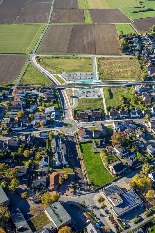 Aerial view, Westtünnen station on Südfeldweg and Von-Thünen-Straße for the future railway station, new Von-Thünen-Straße roundabout, railway line with railway bridge, Rhynern district, Hamm, Ruhr area, North Rhine-Westphalia, Germany, construction site, building plot, construction project, construction site, DE, Europe, large construction site, aerial photography, aerial photography, new building, overview, bird's eye view, birds-eyes view, overview