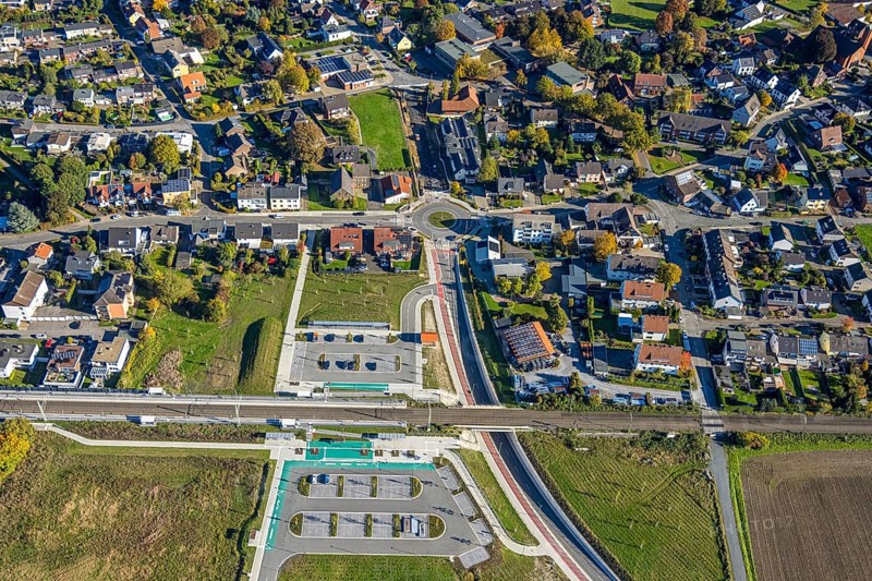 Aerial view, Westtünnen station on Südfeldweg and Von-Thünen-Straße for the future railway station, new Von-Thünen-Straße roundabout, railway line with railway bridge, Rhynern district, Hamm, Ruhr area, North Rhine-Westphalia, Germany, construction site, building plot, construction project, construction site, DE, Europe, large construction site, aerial photography, aerial photography, new building, overview, bird's eye view, birds-eyes view, overview